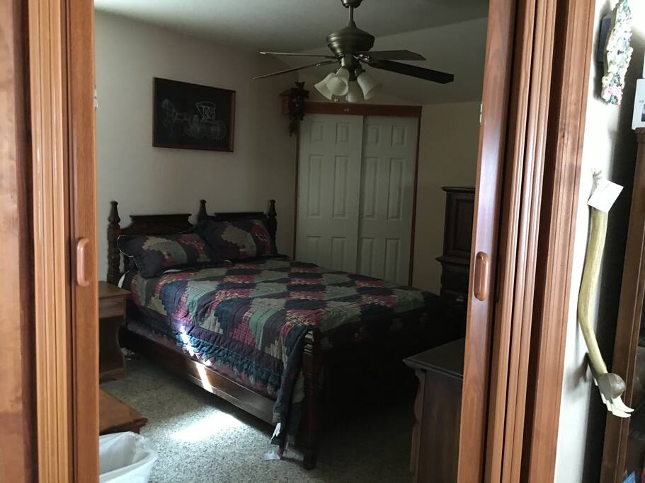 Country quilts warm and welcome you.