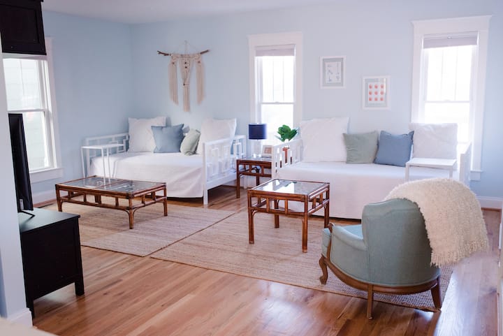 Back living space featuring two twin-sized daybeds