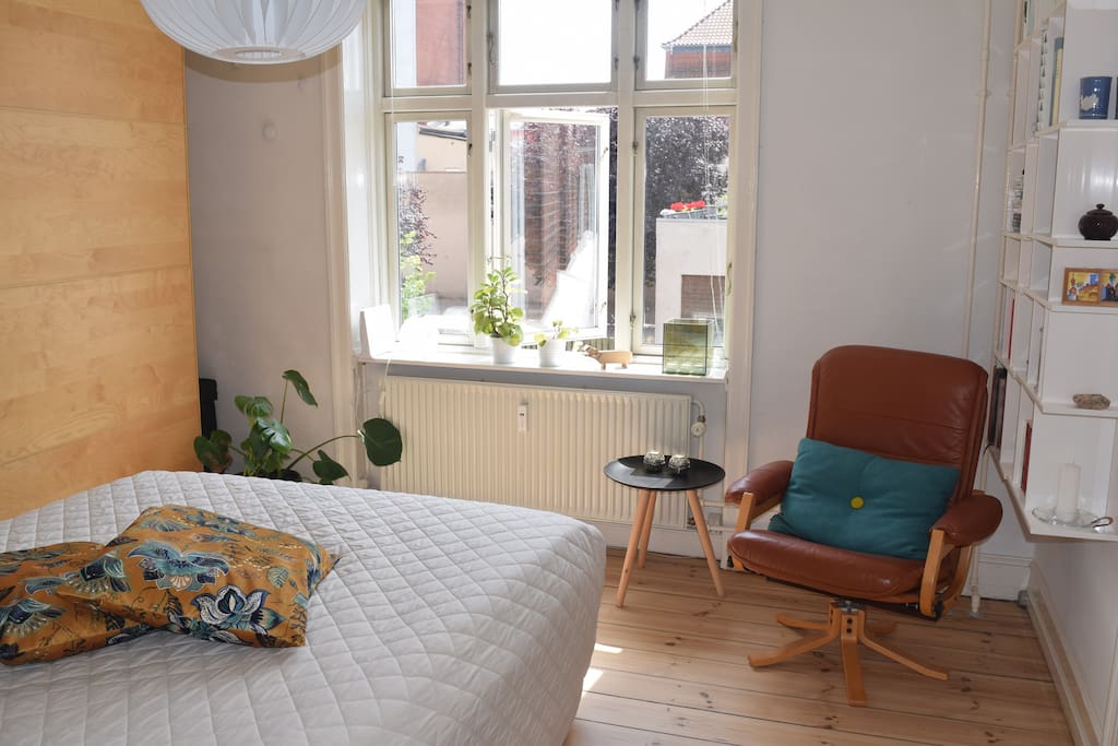 The bedroom is spacious and bright