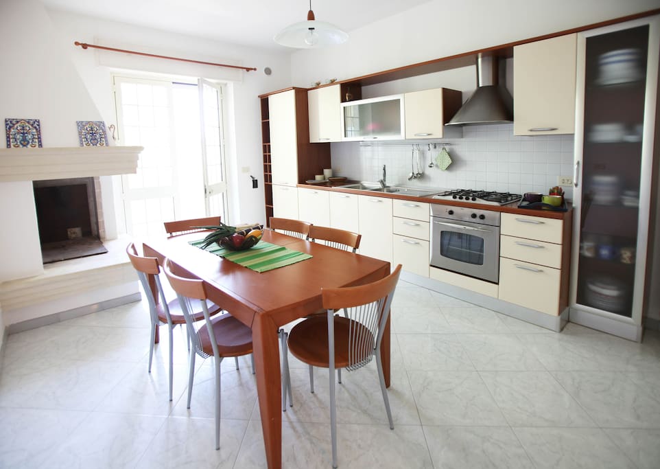 Fully furnished kitchen, in annex a small storage and laundry space.