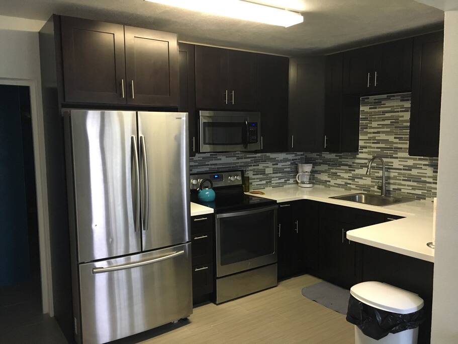 Large modern kitchen with stainless steel appliances