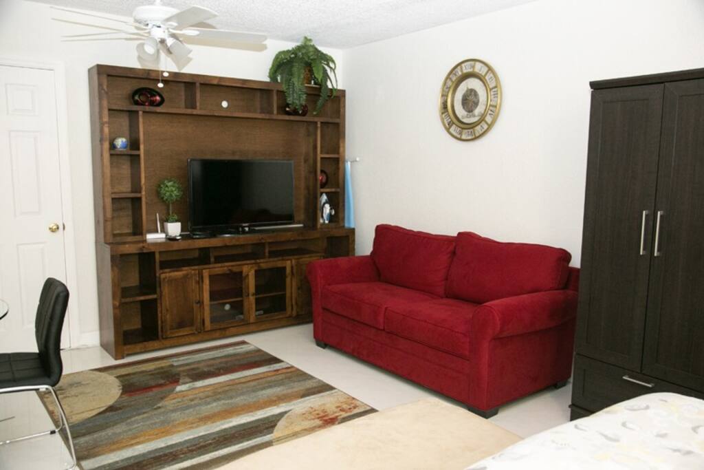 42" Cable TV and queen-size convertible sofa bed. Additional roll-away bed (upon request.) Iron and iron board.