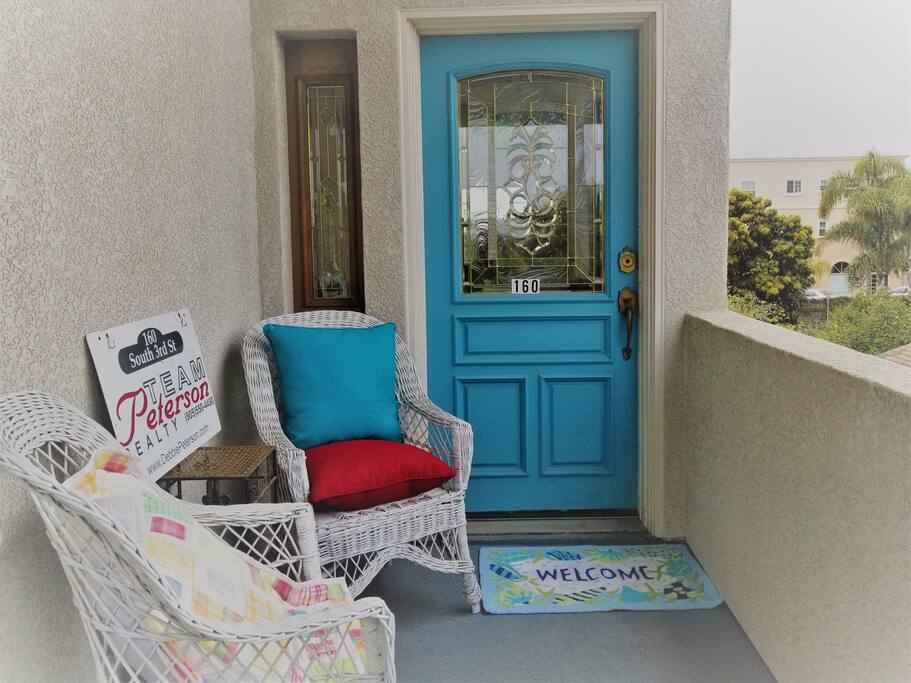 Relax on the front porch while you wait for friends and family.