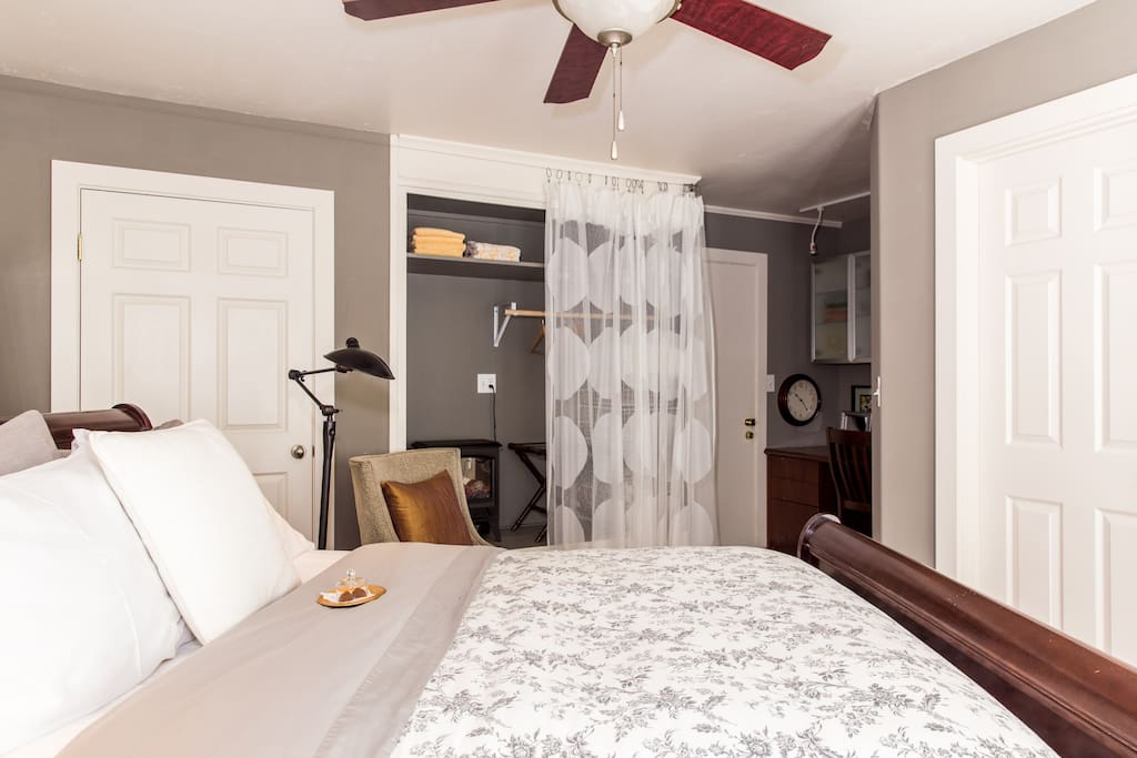 Ample closet with luggage rack, extra linens
