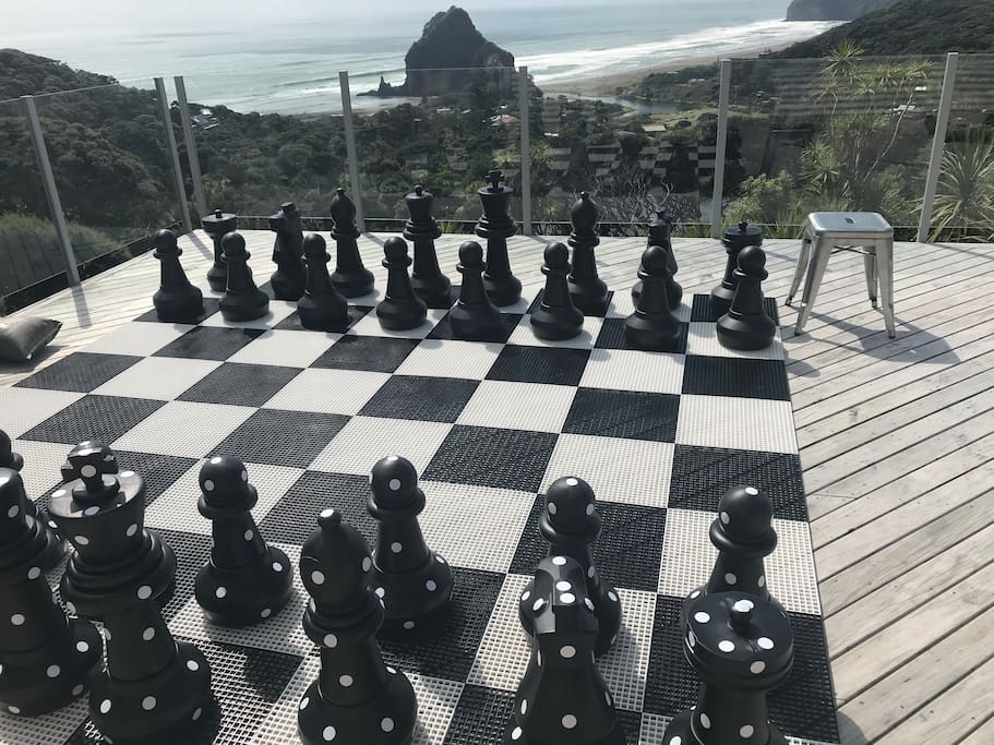 Large decks and stunning Piha Beach views. Outdoor chess set.