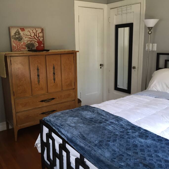 All new linens, blankets, pad, bed skirt, and throw rugs. Closet, full length mirror and robe hooks on door.