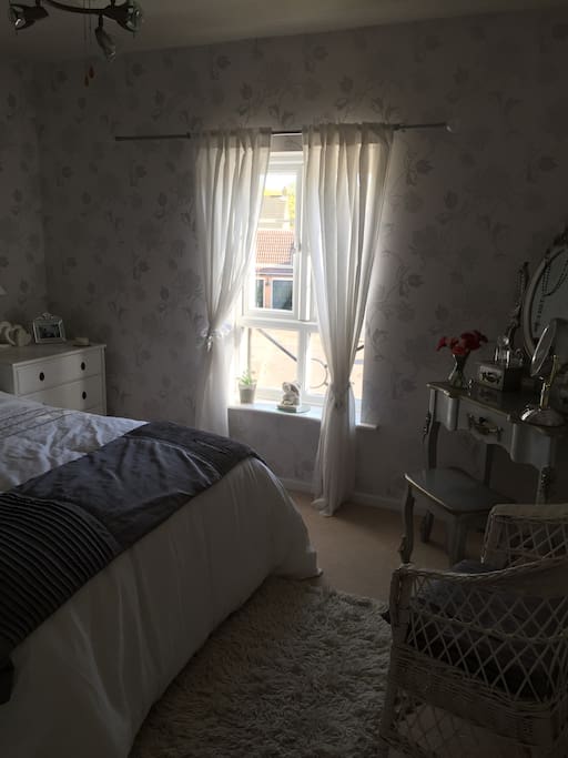 One of the light airy double rooms