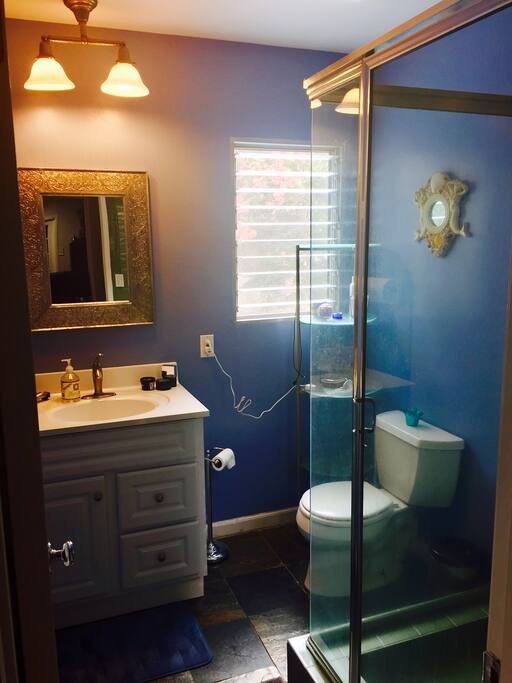 Your private bathroom with heater, vent, window, stone floor, etc.