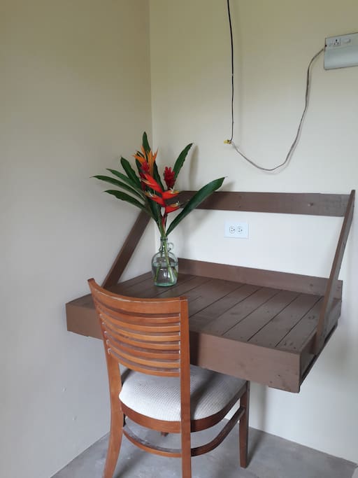 Desk made out of rustic wood.