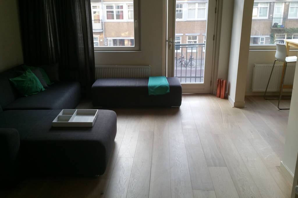 light and spacious living room with sunny balcony