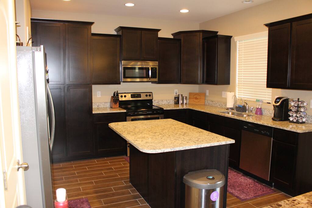 You will enjoy making meals in this kitchen with it's brand new stainless steal appliances. For your convenience you will also find pots and pans, cooking utensils, silverware, glassware, plates and bowls, dining table, and a coffee maker.