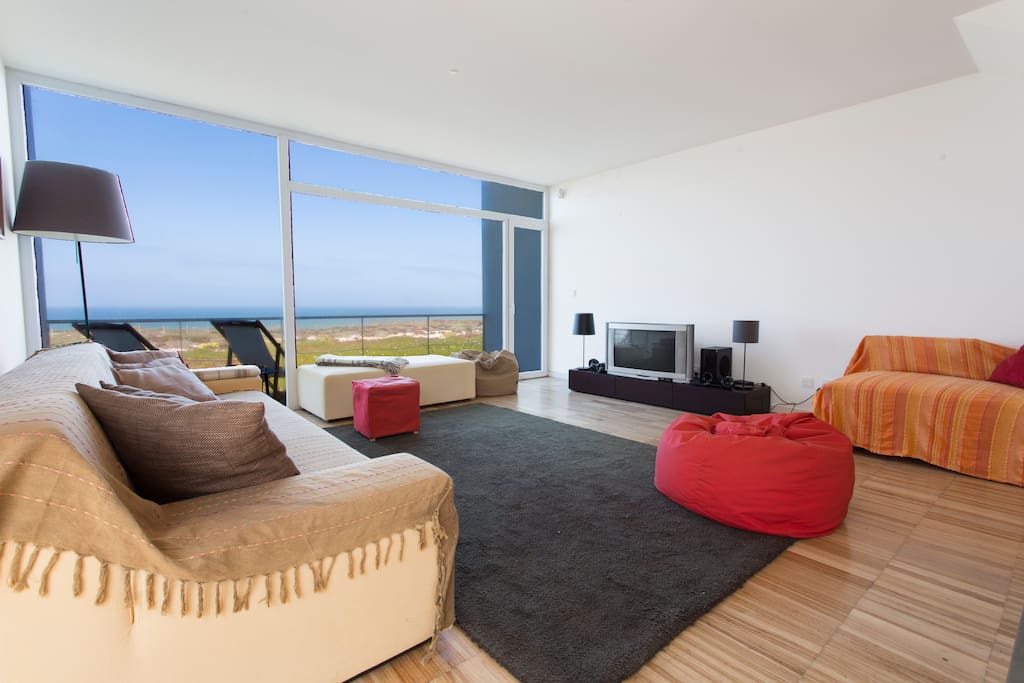 Living room with outside balcony and a dream view.
