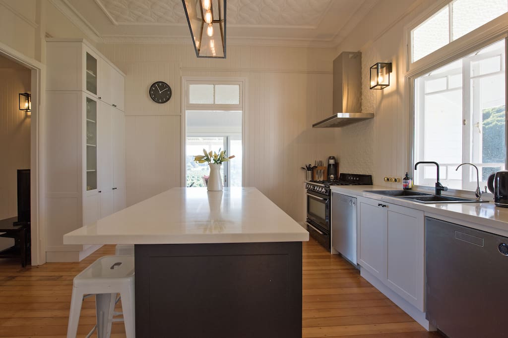 Kitchen with breakfast island bench