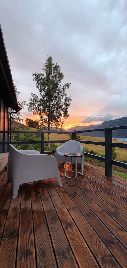 Successful Airbnb property: Nordfjordcabins BLUE, view at fjord and mountains in Stryn