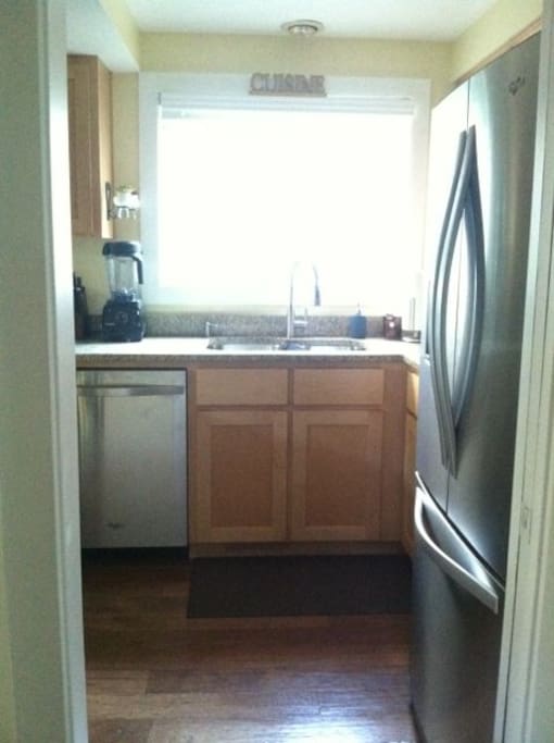 Bright kitchen with new appliances