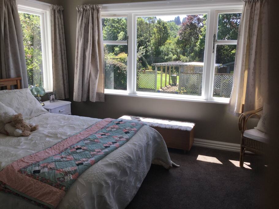 Bedroom one with queen bed
