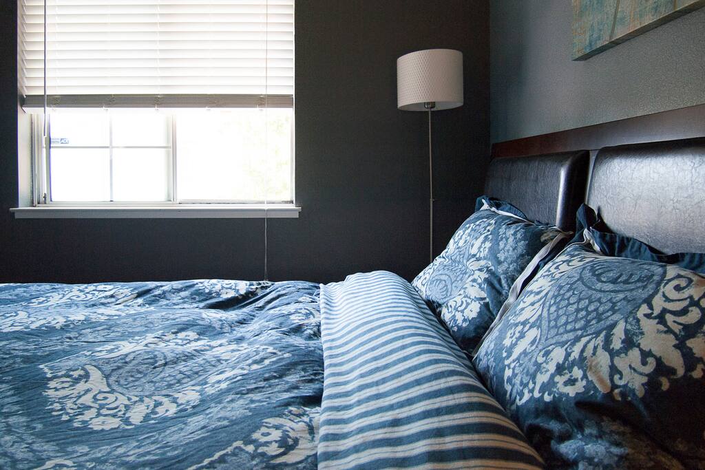 Feel the fresh air from your large window, looking down the backyard
