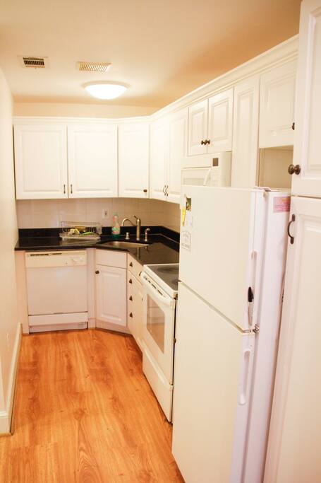 Full kitchen with granite countertops