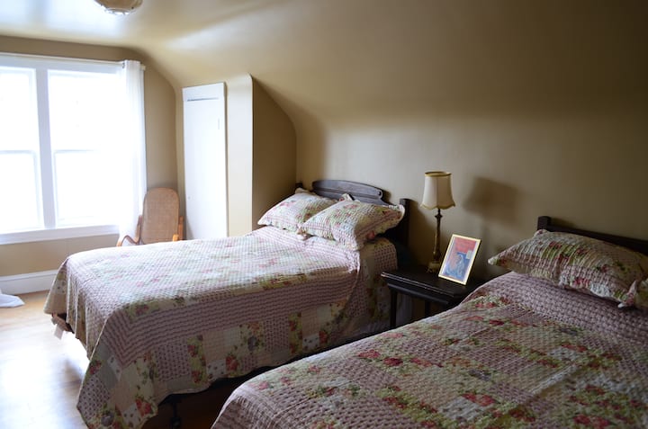 Bedroom 1 - Two comfortable double beds in a spacious room. 