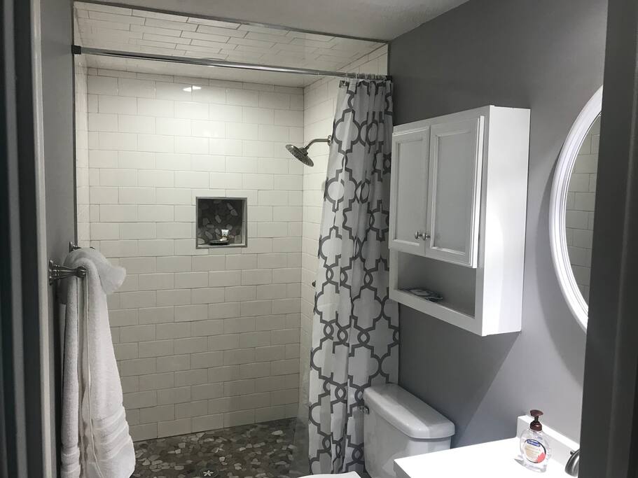 Your bathroom with walk-in rainfall shower that you won’t want to leave. It’s so nice and relaxing.