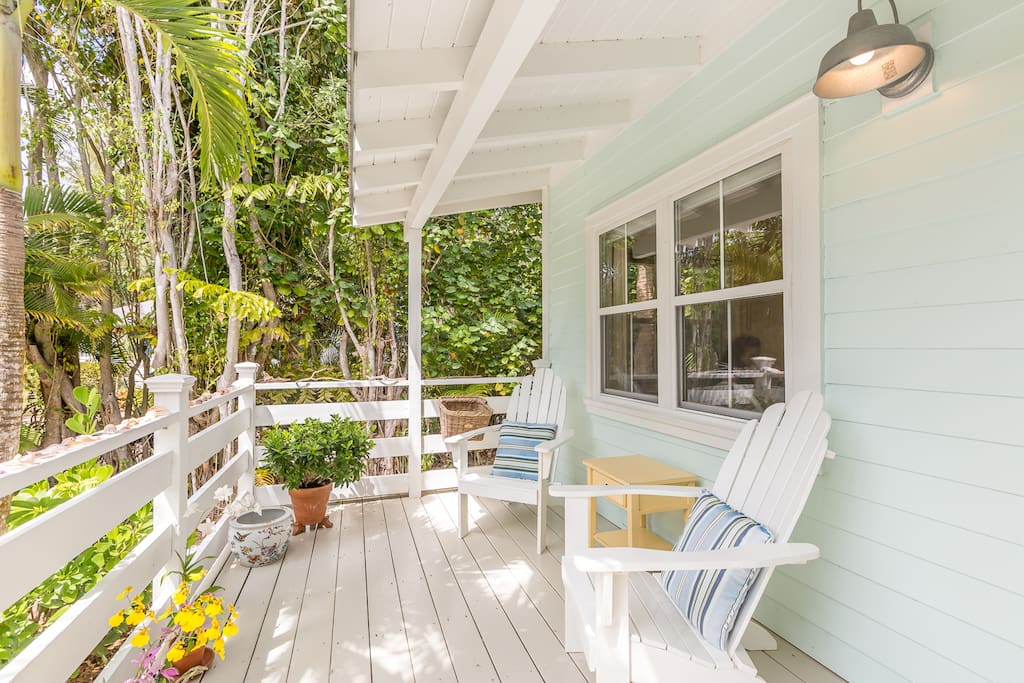 Relax on the front porch with matching Adirondack chairs