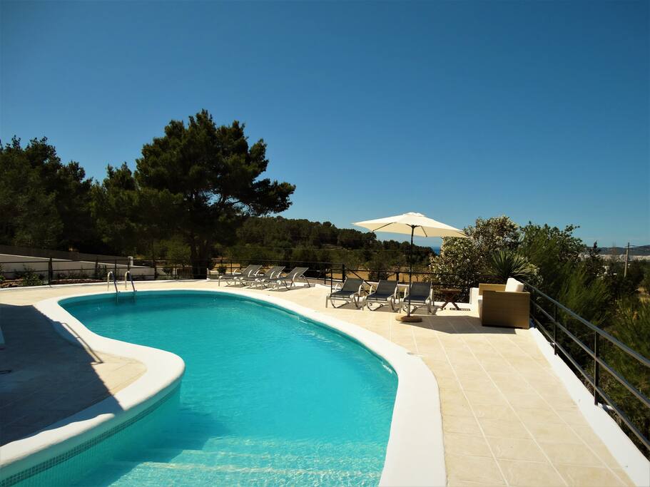 Pool area with large terrace.