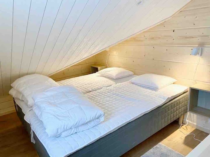 Dormitorio 5 en el loft con dos camas individuales. 