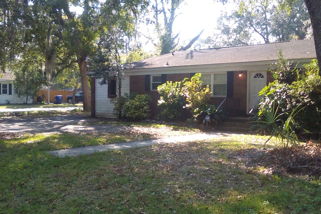 Front of House View on a corner Lot two blocks ofF Folly Road a few blocks to the Bridge to Downtown Charleston. Movie theater, Grocery, post office, shopping all right across the St. Walking Biking Distance less than half a mile to Shopping center
