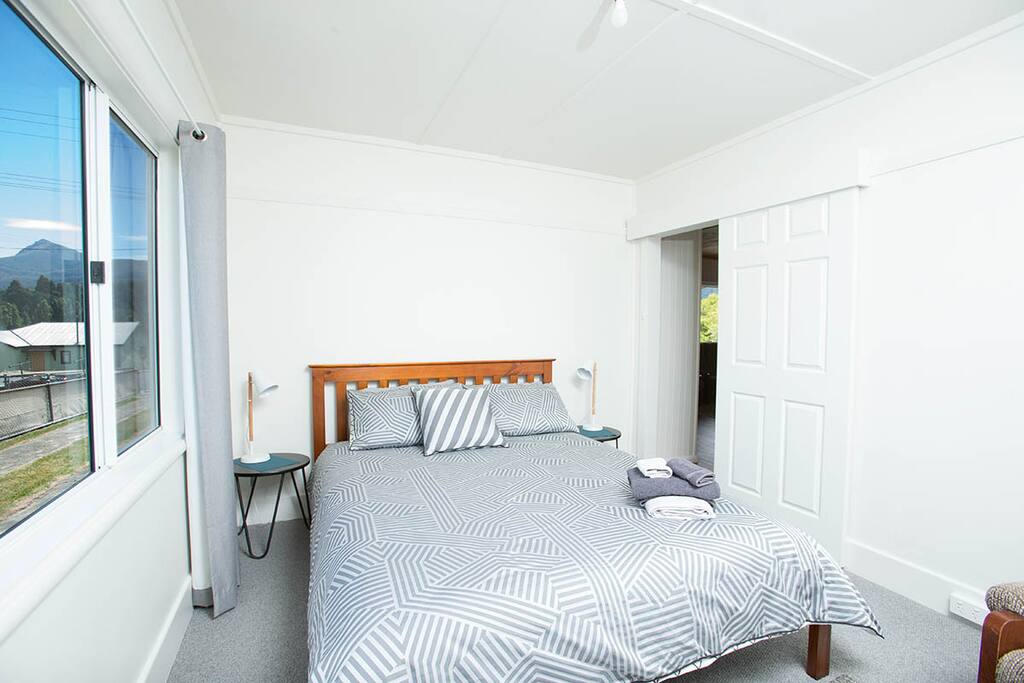 Queen bed in bedroom 1
