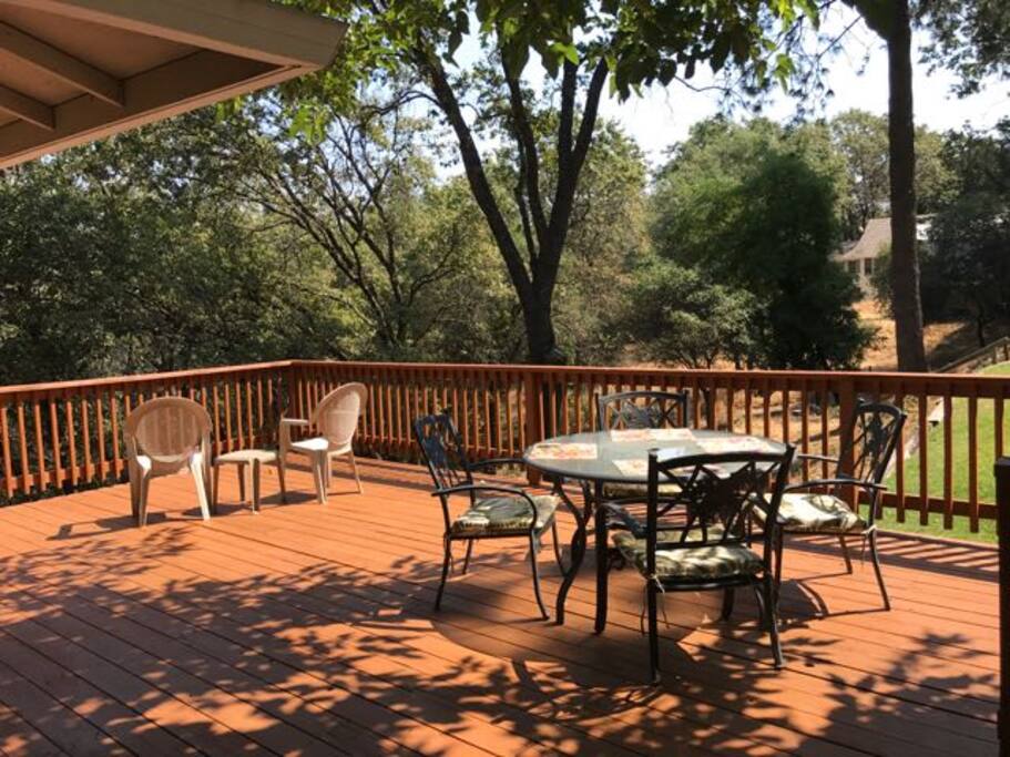 Enjoy eating or just relaxing on the wrap-around deck.