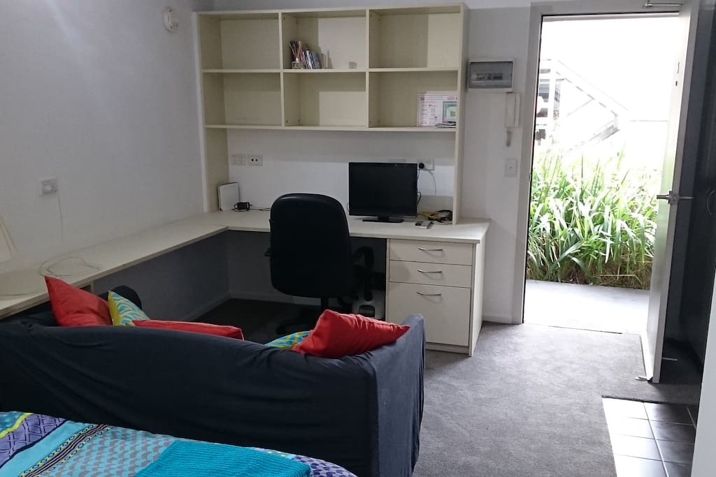 The room has a couch for sitting and relaxing. A small TV and unlimited Internet.
