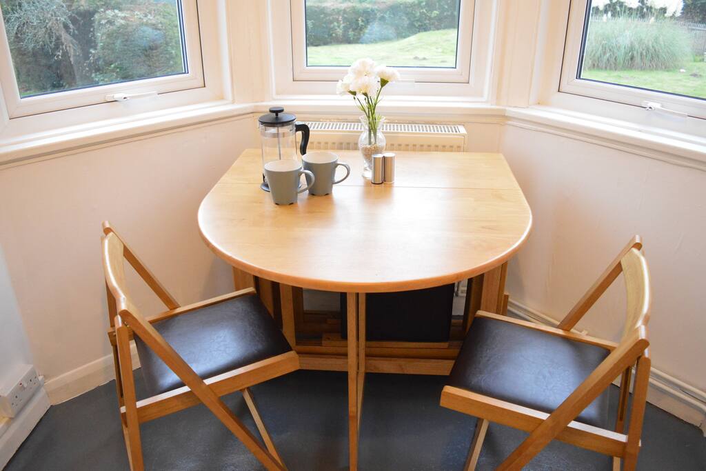 Dining area overlooking gardens.