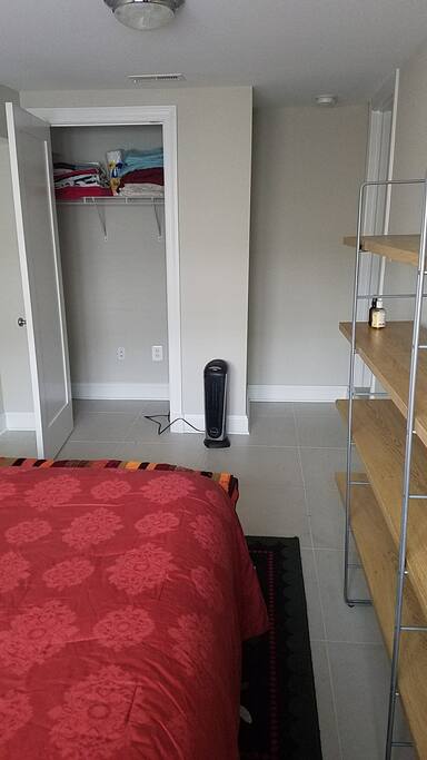 Closet space and shelving for storage.