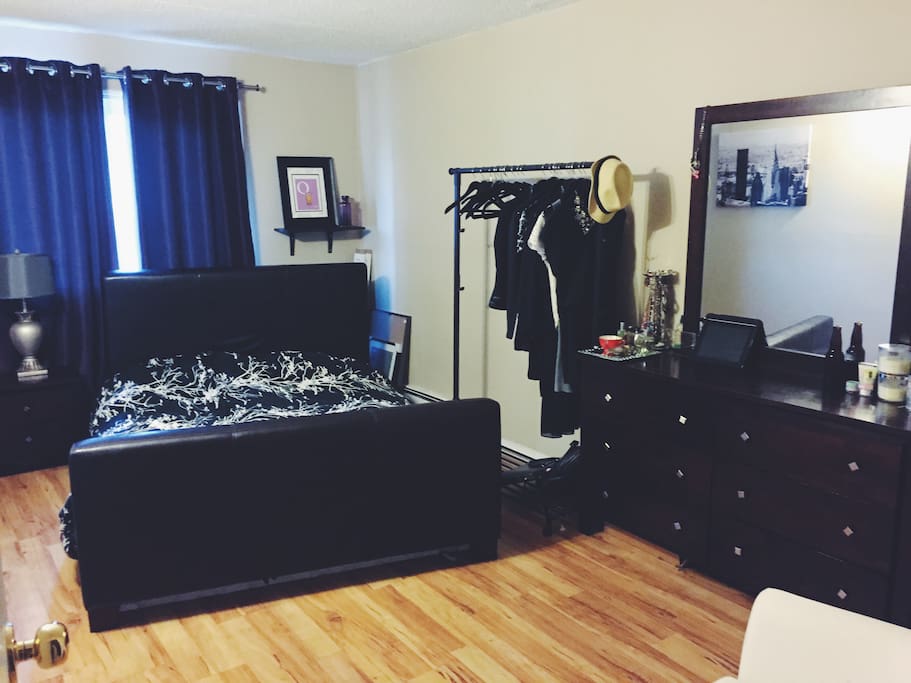 Bedroom - large Queen bed, spacious bedroom with hanging rack. Can accommodate an extra airbed for extra guests if necessary.