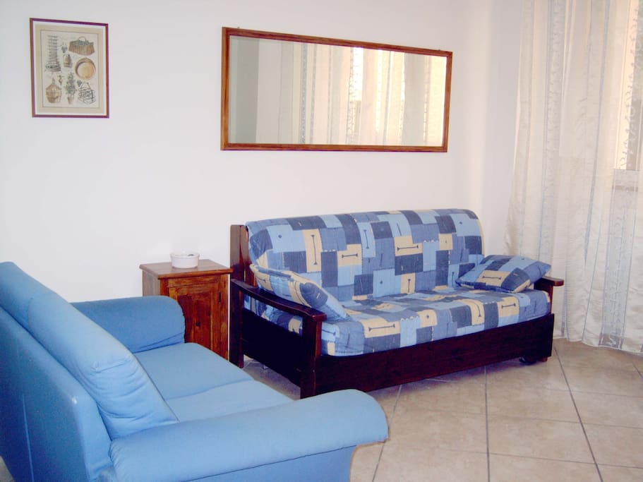 Soggiorno con divano letto