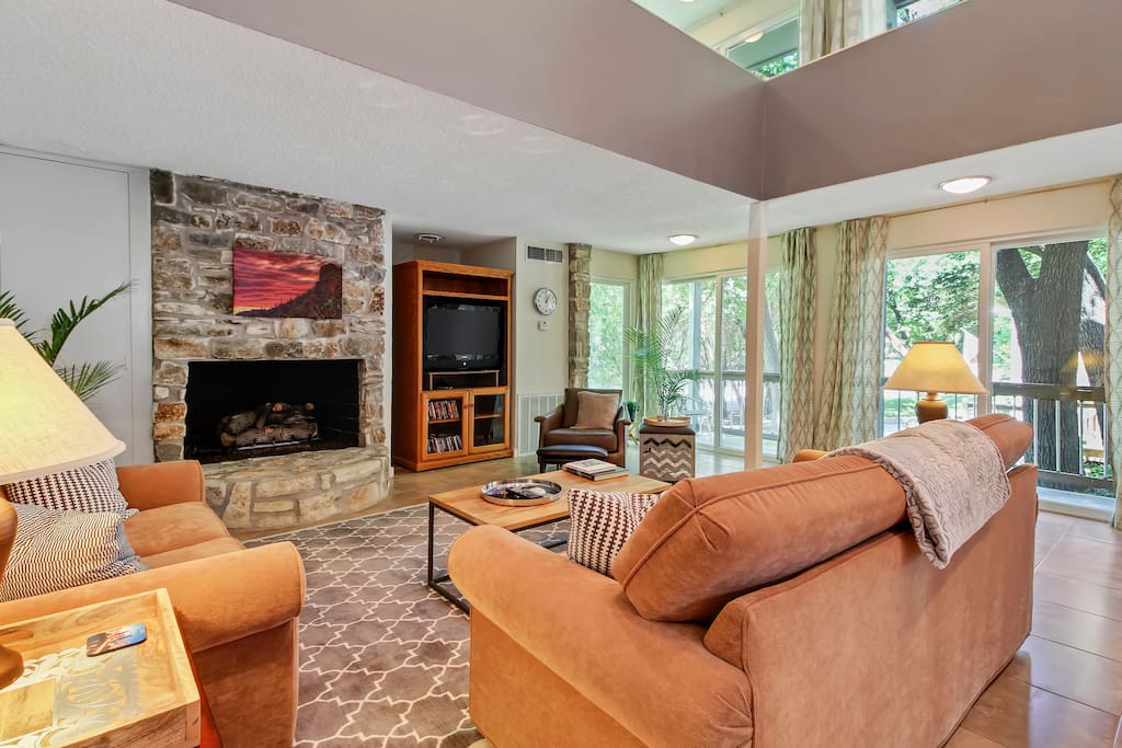 Living room with gas fireplace and queen size sofa bed