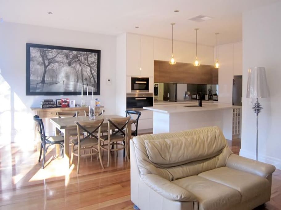 Relax by the fire in the open-plan living and kitchen area