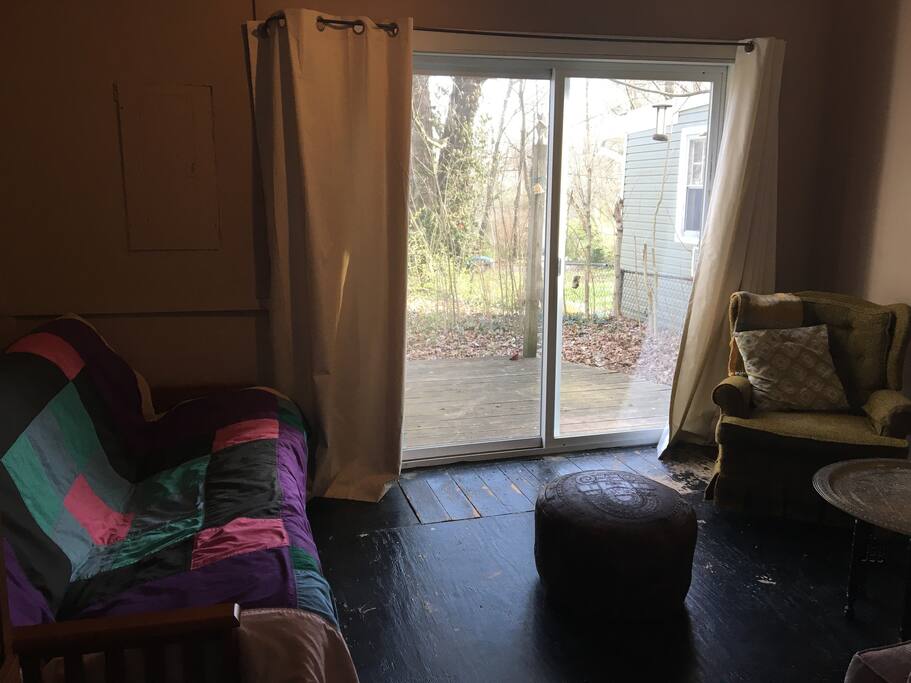 Queen size futon bed in the sitting room