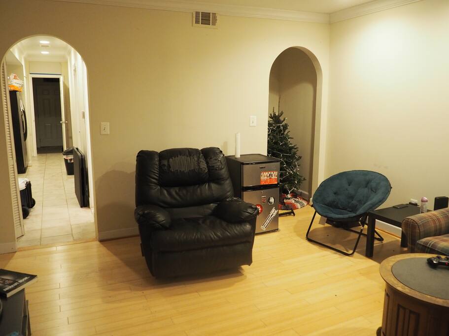 Here's another view of the living room, where you can see the reclining chair and mini-fridge.
