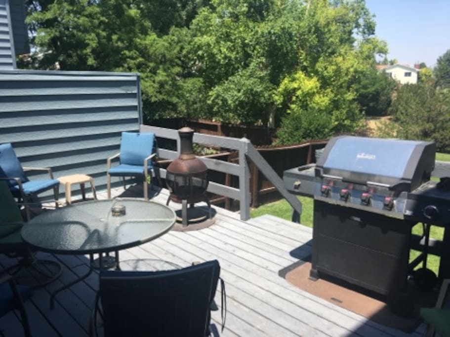 Peaceful patio with convenient grilling amenities.
