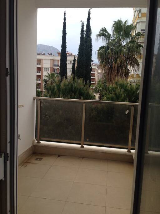 Balcony with table and 4 chairs