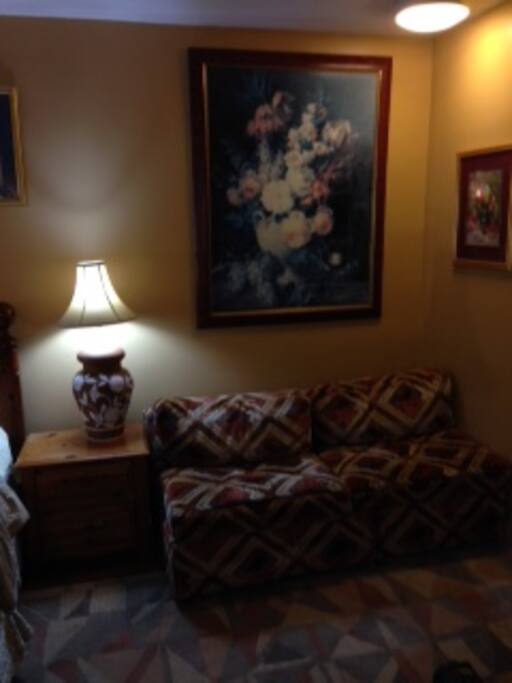 A double bed or pull out sleeper sofa (your choice) for 2nd or 3rd guest. Sleeper sofa shown in this picture can be substituted with double bed