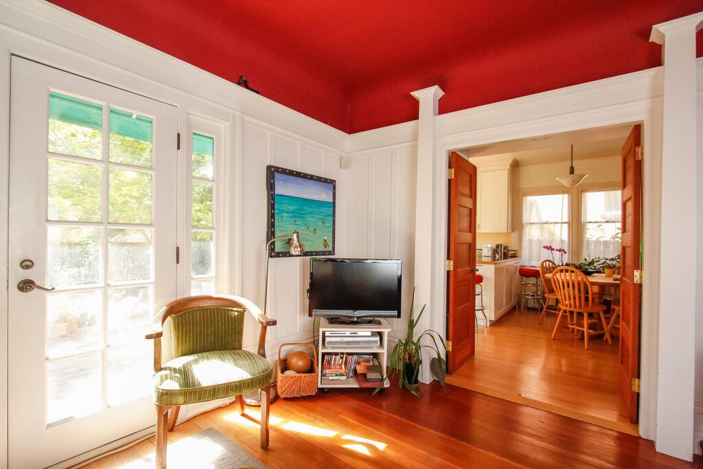 There used to be a fireplace and chimney where that doorway is into the kitchen.