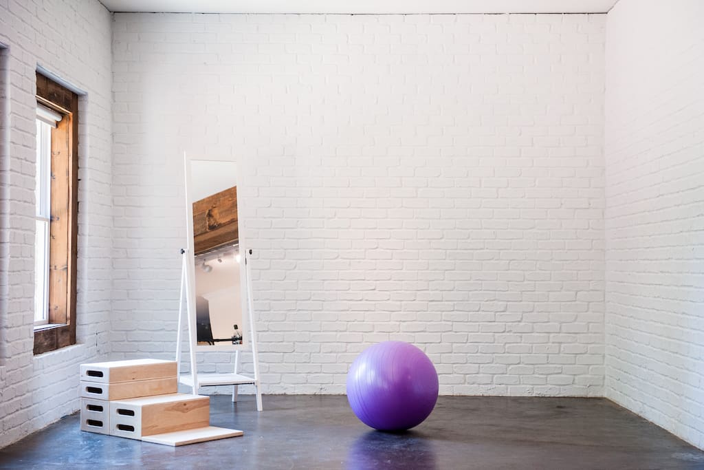 This beautiful, open studio efficiency includes: 10-ft ceilings throughout; living room w/ year-round fireplace and roll-away 52" flat screen TV; hi-tech movie theater; wet bar kitchenette (+stovetop and refrigerator not shown); open gameroom/workout space; bathroom w/ modern glass shower.