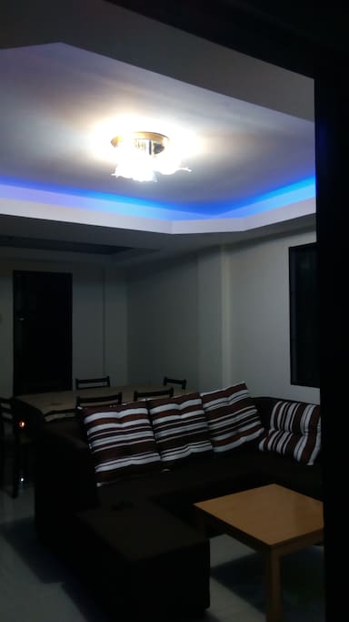 Living room with dim light and chandelier