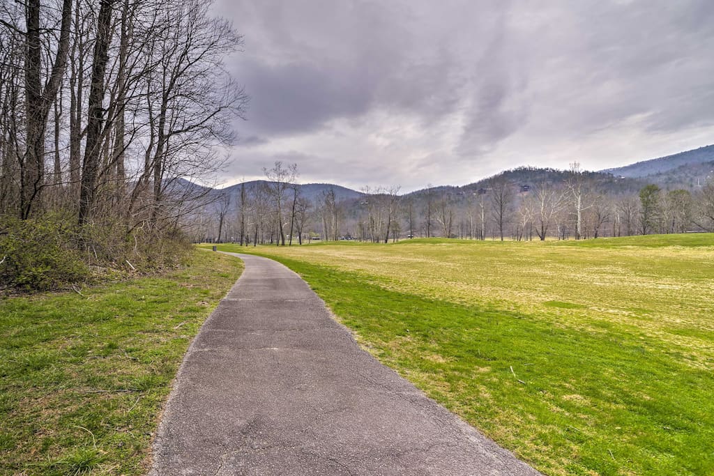 Enjoy strolling around the golf course in front of these mountain vistas.