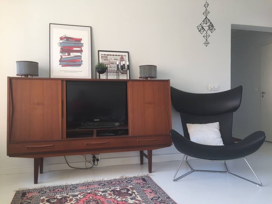 TV is hidden on the sideboard