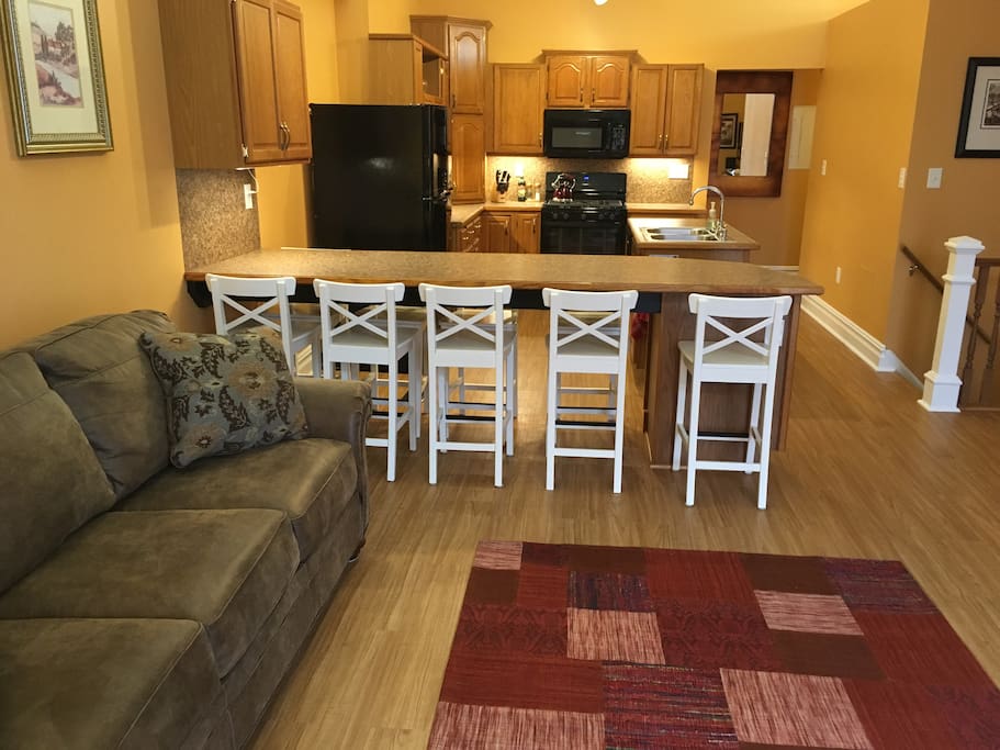 Living room with kitchen beyond