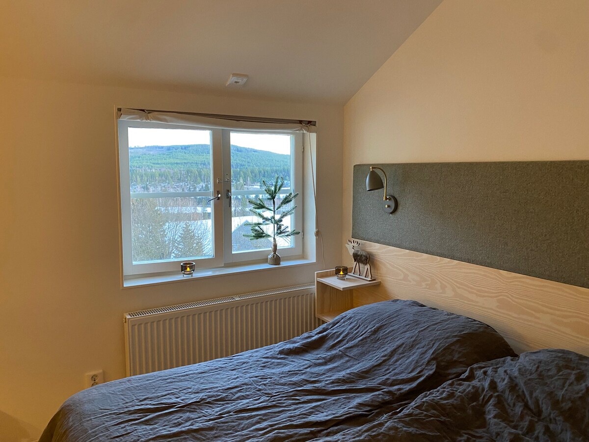 Double bed with view over the river and the mountains. 
There is also an extra bed in the apartment if needed. 