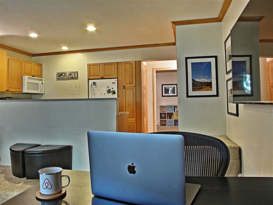 Comfortable workspace with Aeron chair in front of 65" 4K TV